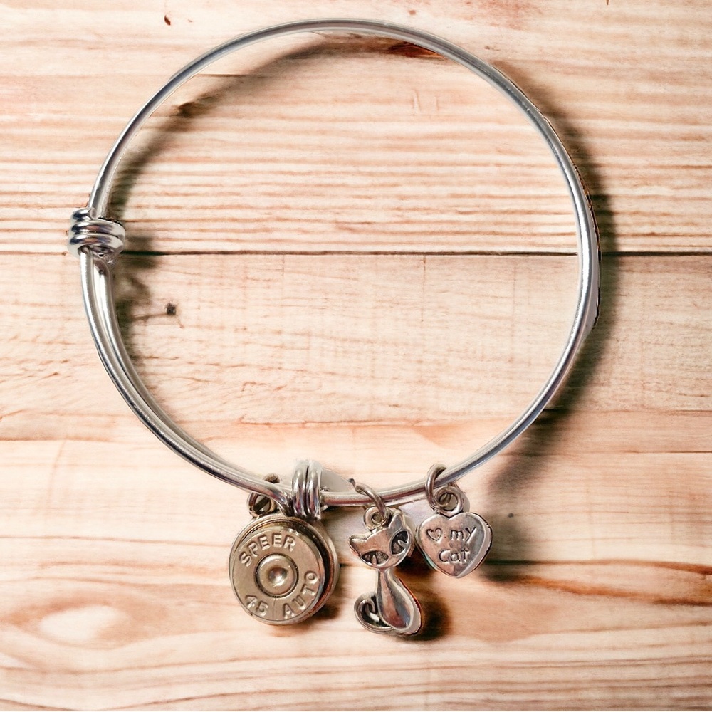 Custom Bracelet With Bullet And Cat Charms

Check out my other listings